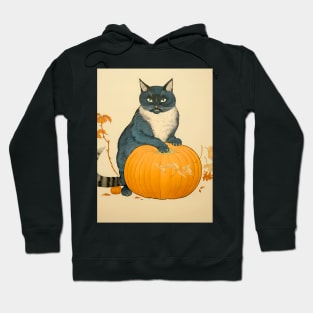 Japanese Cat on a Halloween Pumpkin During the Halloween Season on a Dark Background Hoodie